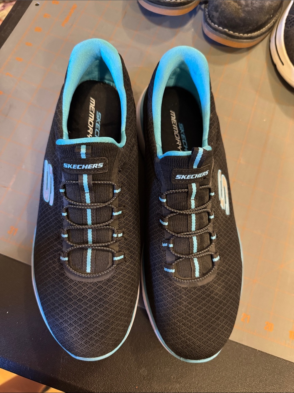 Skechers Black Sneakers with Aqua Accents